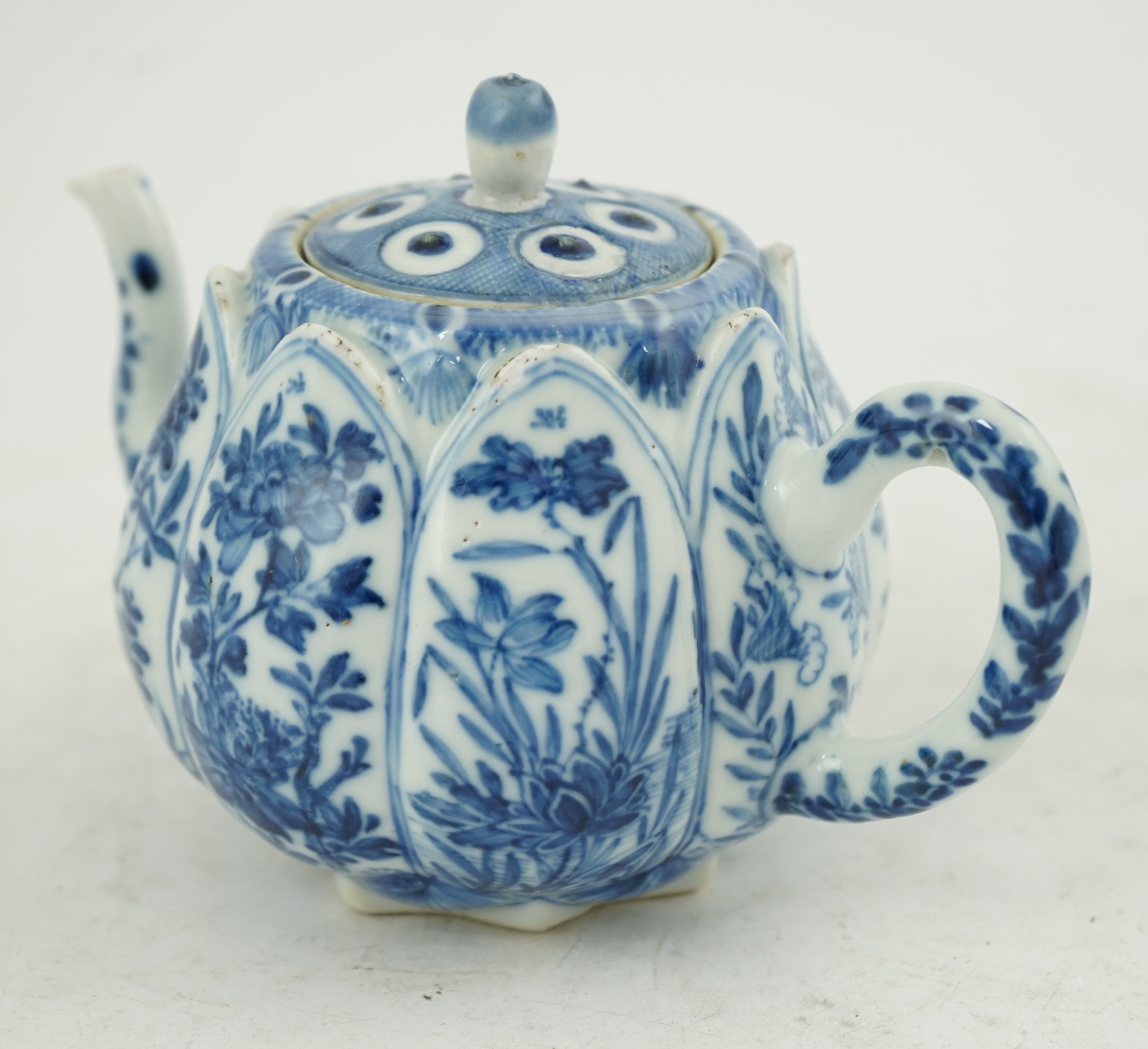 A Chinese blue and white lotus pod-shaped teapot and cover, Kangxi period